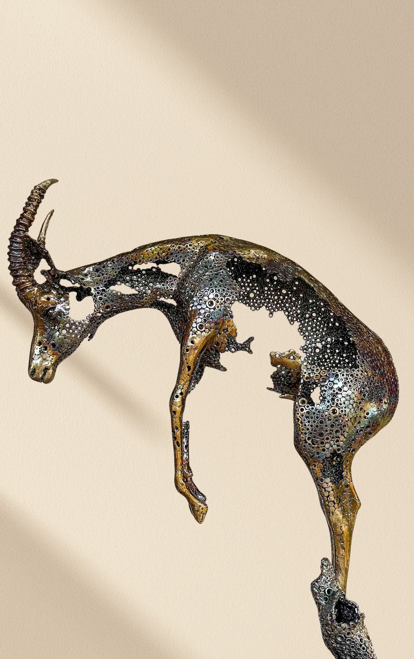 sprinbok sculpture in a gallery